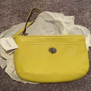 Coach yellow small pouch